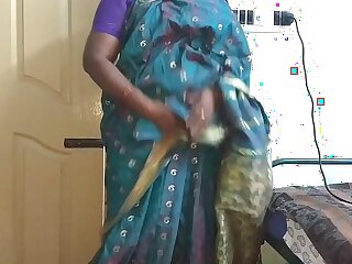 desi indian tamil telugu kannada malayalam hindi horny premier spliced vanitha wearing blue colour saree showing broad in the beam boobs and shaved pussy press hard boobs press nip rubbing pussy masturbation